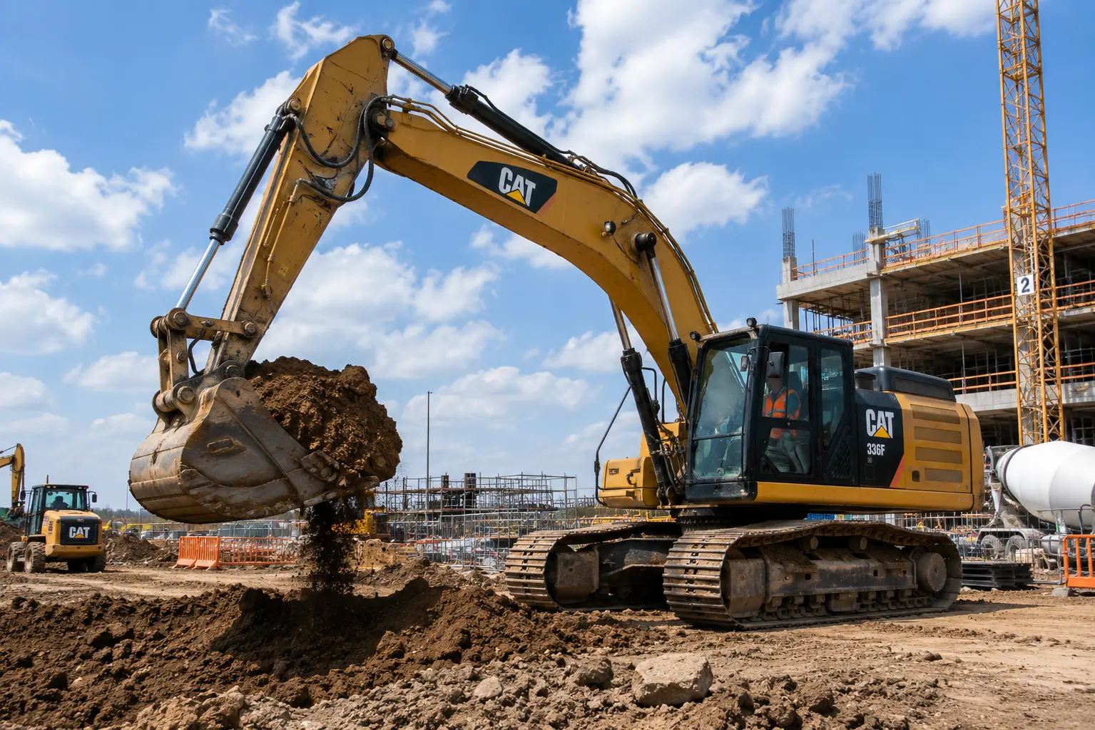 Excavator working on bustling construction site